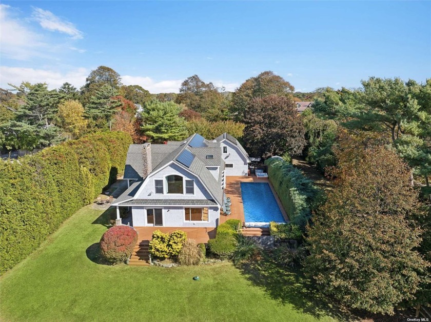 Experience luxury and tranquility in this remarkable turnkey - Beach Home for sale in East Moriches, New York on Beachhouse.com