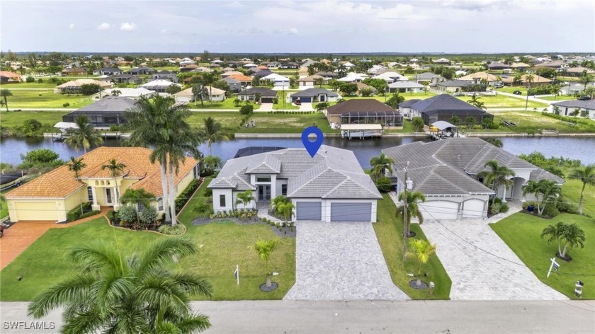 This custom Gulf access 4 bed, 3 bath, 3 car garage home has all - Beach Home for sale in Cape Coral, Florida on Beachhouse.com