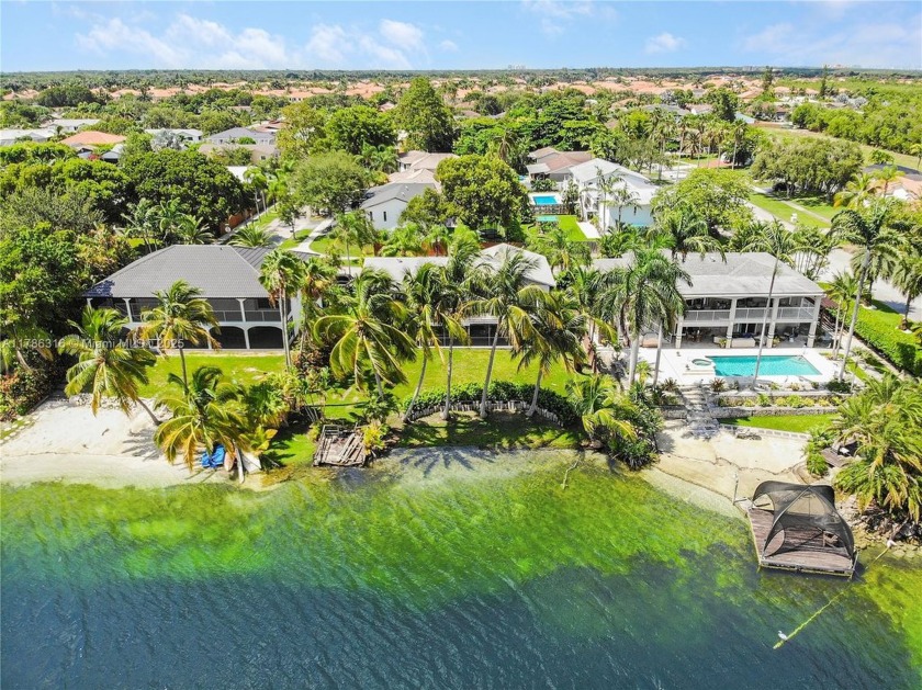 This spacious 4-bed, 3-bath lakefront home offers over 3,000 sq - Beach Home for sale in Cutler Bay, Florida on Beachhouse.com