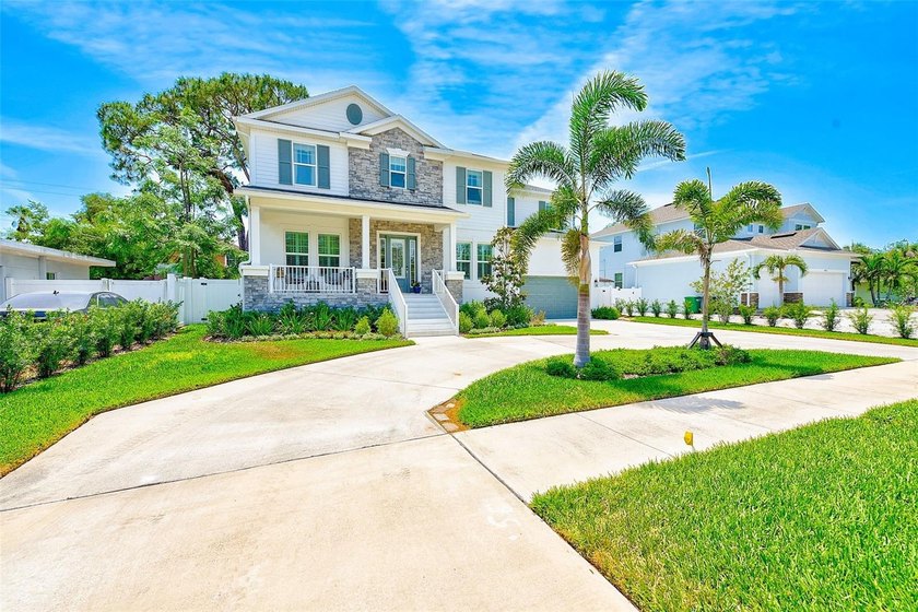 Welcome to this exceptional 2022-built David Weekley home - Beach Home for sale in Tampa, Florida on Beachhouse.com