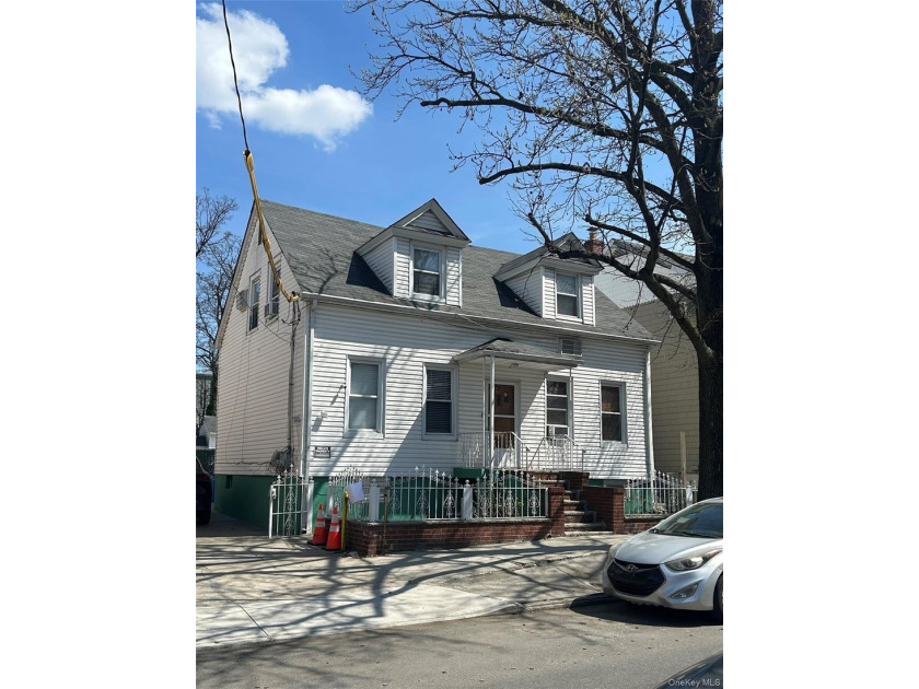 Nice 2 family home with private yard and parking walk to - Beach Home for sale in College Point, New York on Beachhouse.com