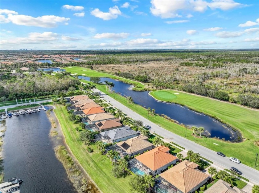 SOUTHERN EXPOSURE/NAVIGABLE LAKE ACCESS PLUS GOLF & WATER VIEWS - Beach Home for sale in Naples, Florida on Beachhouse.com