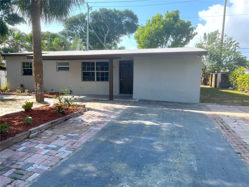 PRICED TO SELL!! Remarkable 4 bedroom/ 2 bathroom home located - Beach Home for sale in Pompano  Beach, Florida on Beachhouse.com