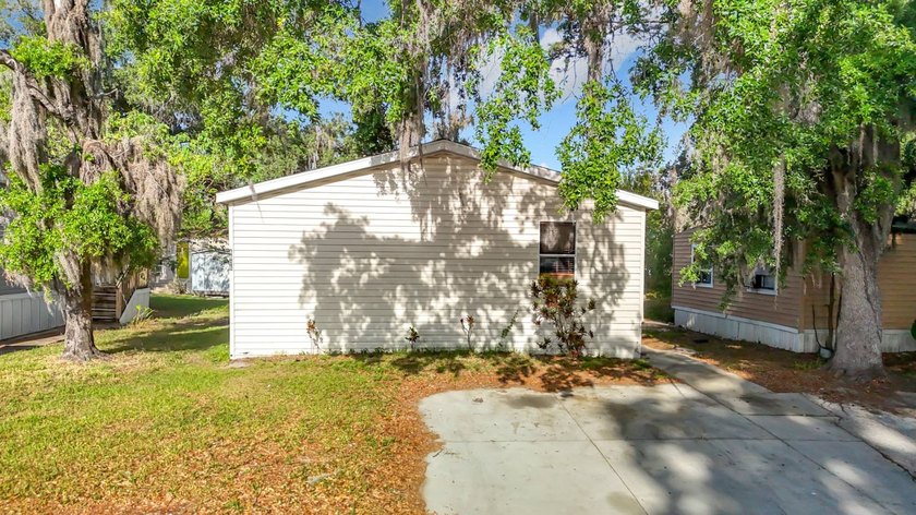 (Espanol a continuacion)  Welcome to Paradise Village, an All - Beach Home for sale in Tampa, Florida on Beachhouse.com