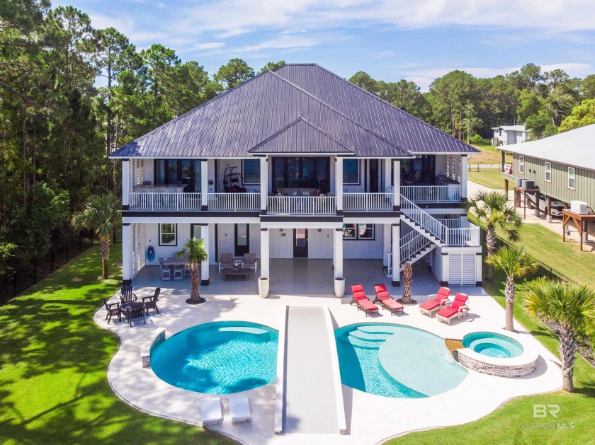 Welcome to your coastal dream retreat on Bay La Launch, where - Beach Home for sale in Orange Beach, Alabama on Beachhouse.com