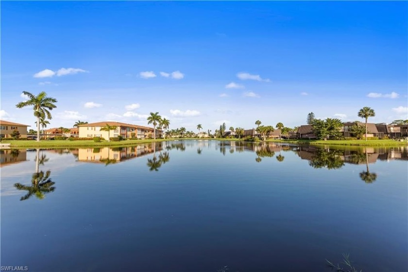 This attractive second-floor condo has stunning lake views from - Beach Home for sale in Naples, Florida on Beachhouse.com