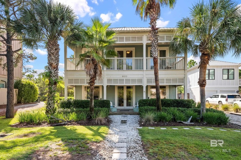 Experience refined coastal living in this beautiful two-story - Beach Home for sale in Gulf Shores, Alabama on Beachhouse.com