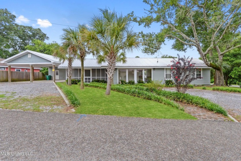 Welcome to this charming home, perfectly situated on a corner - Beach Home for sale in Bay Saint Louis, Mississippi on Beachhouse.com