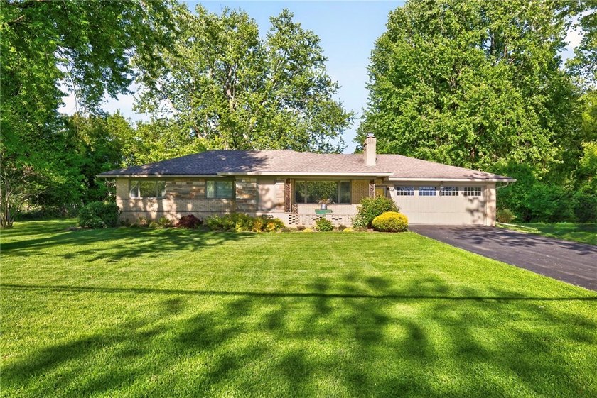 Welcome to a rare opportunity in Webster-where privacy, nature - Beach Home for sale in Webster, New York on Beachhouse.com