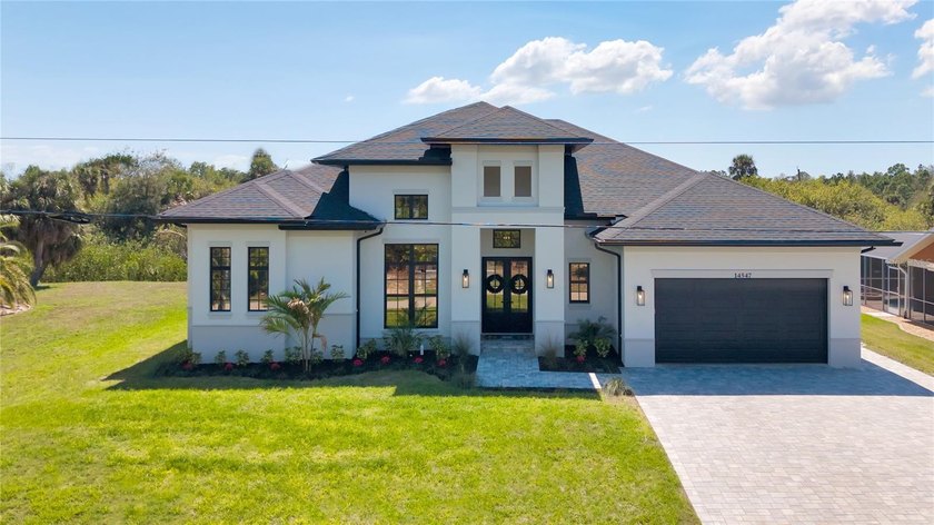 Step into this beautiful custom-built 2026 home, where - Beach Home for sale in Port Charlotte, Florida on Beachhouse.com