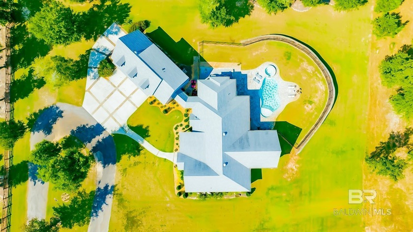 Experience timeless elegance and modern sophistication in this - Beach Home for sale in Spanish Fort, Alabama on Beachhouse.com