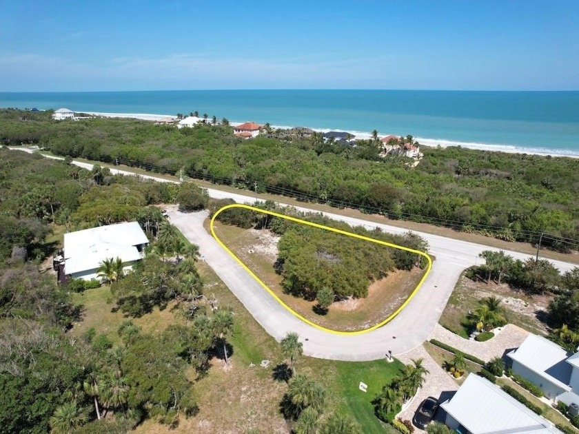 Nestled on a picturesque 0.32-acre lot along a coveted barrier - Beach Lot for sale in Vero Beach, Florida on Beachhouse.com