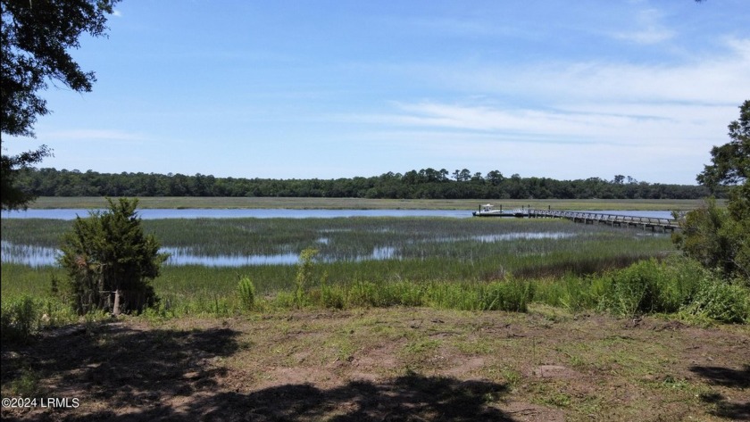 Enjoy expansive waterfront views from this gorgeous 1 acre DEEP - Beach Lot for sale in Saint Helena Island, South Carolina on Beachhouse.com