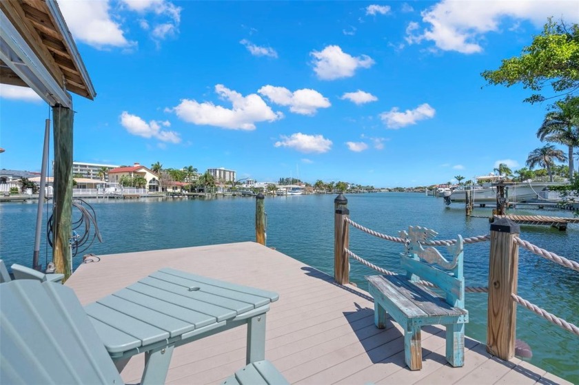 Welcome to 106 Midway Island in Clearwater Beach. Start living - Beach Home for sale in Clearwater Beach, Florida on Beachhouse.com