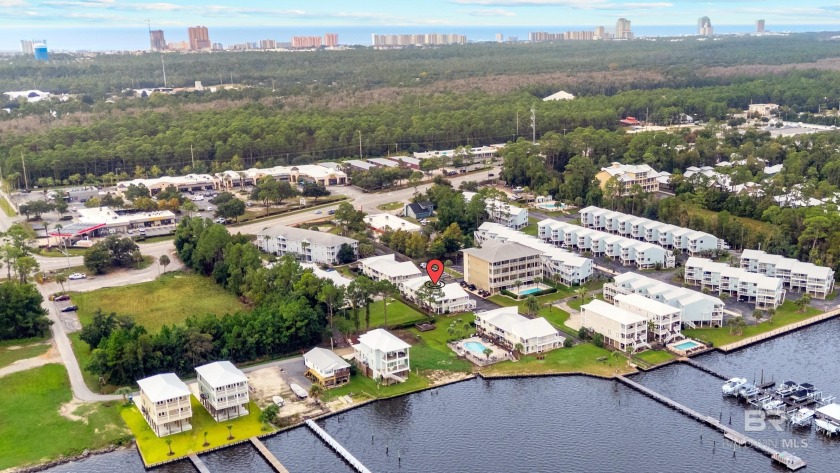 Welcome to Wolf Bay Villas unit 205. This top floor corner unit - Beach Condo for sale in Orange Beach, Alabama on Beachhouse.com
