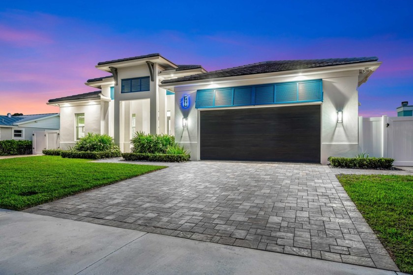 This stunning new construction (2022) waterfront home in North - Beach Home for sale in North Palm Beach, Florida on Beachhouse.com