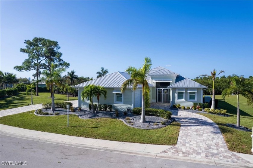 This Stunning Custom Built Pool Home sits on 3.87 acres of Gulf - Beach Home for sale in North Fort Myers, Florida on Beachhouse.com