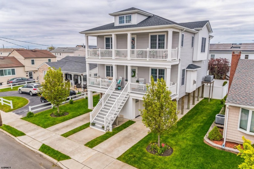 Experience coastal living at its finest in this elegant and - Beach Home for sale in Ventnor, New Jersey on Beachhouse.com