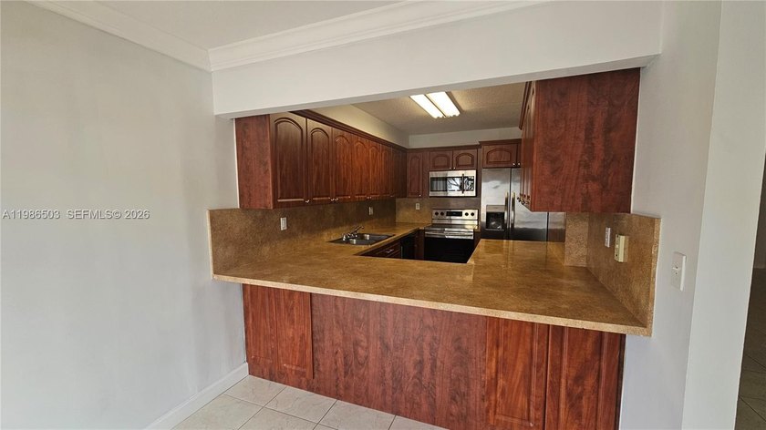 First floor unit located in the private community of Miller - Beach Condo for sale in Miami, Florida on Beachhouse.com