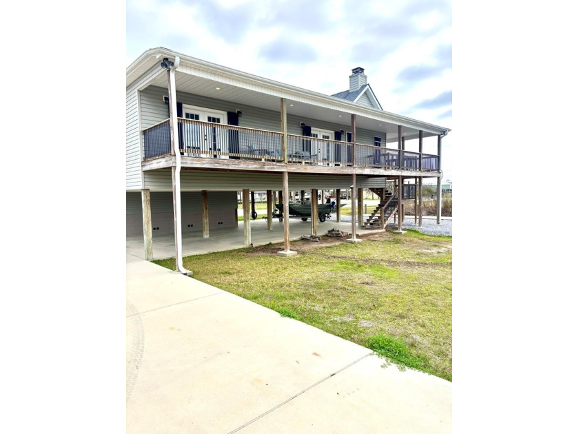 Deep-water canal living in Bay St Louis. Welcome to your dream - Beach Home for sale in Bay Saint Louis, Mississippi on Beachhouse.com