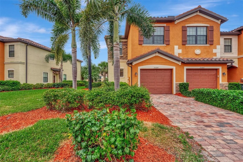 Welcome to the epitome of lakeside luxury living! Nestled within - Beach Townhome/Townhouse for sale in Venice, Florida on Beachhouse.com