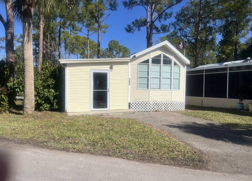 This PRISTINE 2-Bedroom, 1-Bathroom home is in Oak Springs RV - Beach Home for sale in Port Richey, Florida on Beachhouse.com