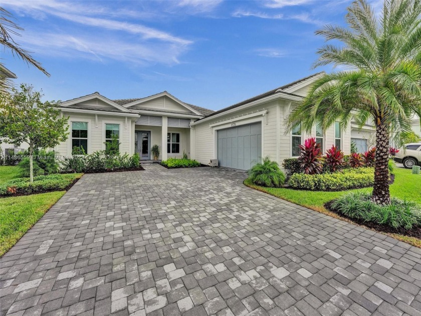 MOVE IN READY with UPGRADES! Discover unparalleled new - Beach Home for sale in Palm Beach Gardens, Florida on Beachhouse.com