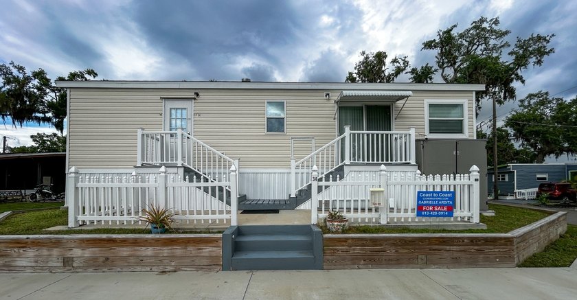 Catch stunning water views while staying high and dry in this - Beach Home for sale in Ellenton, Florida on Beachhouse.com