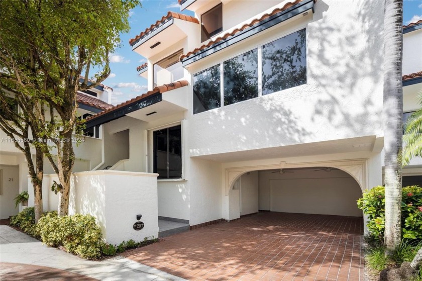 Magnificent tri-level villa in the private community of L - Beach Townhome/Townhouse for sale in Coconut Grove, Florida on Beachhouse.com