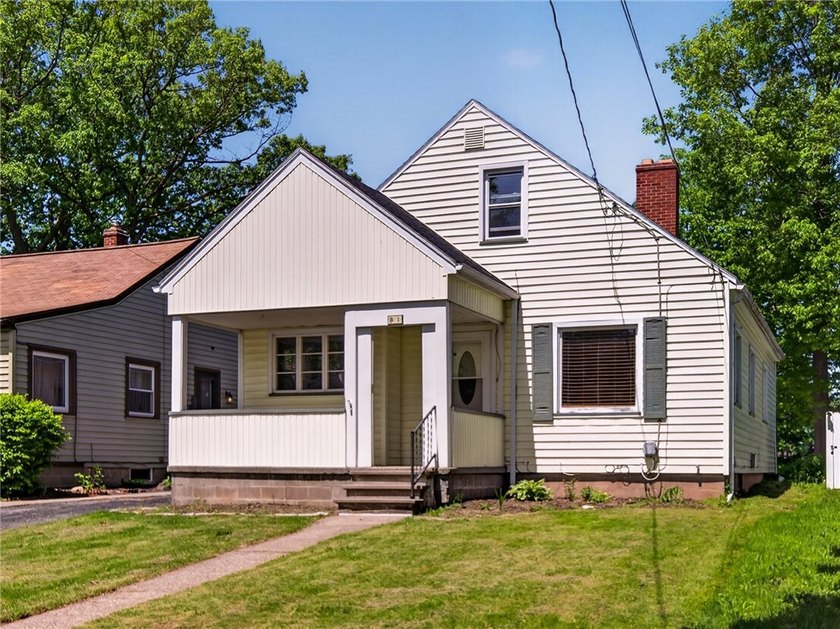 Updated cute Charlotte cape cod just a quick walk from the - Beach Home for sale in Rochester, New York on Beachhouse.com