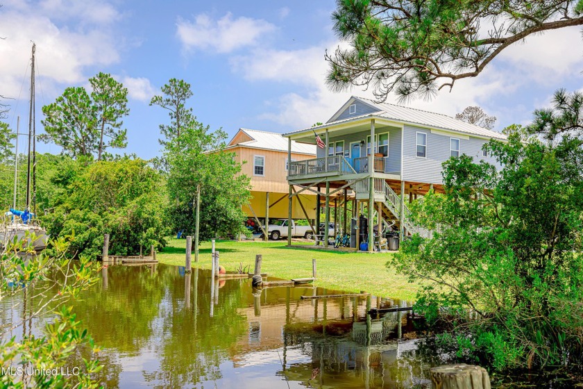 Welcome to your perfect getaway! Nestled on the serene canals of - Beach Home for sale in Bay Saint Louis, Mississippi on Beachhouse.com