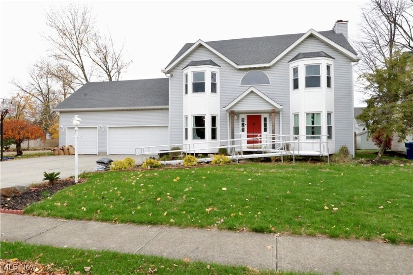 This beautiful colonial has a ton of space for you and your - Beach Home for sale in Sheffield Lake, Ohio on Beachhouse.com