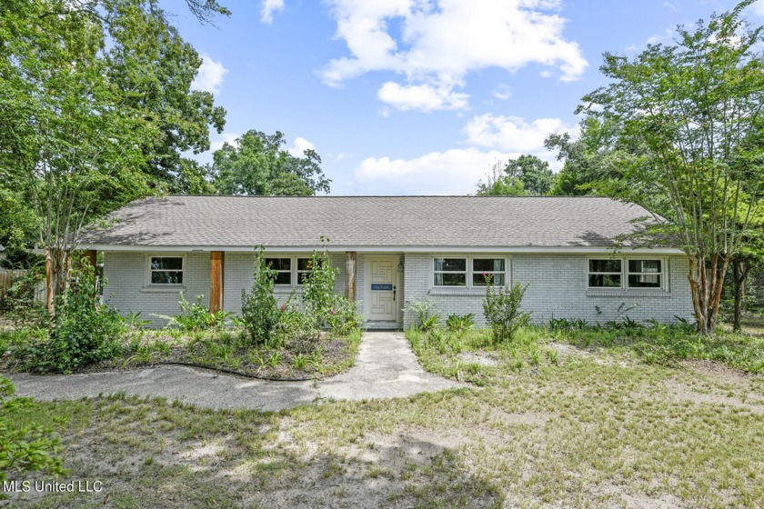 Stylish three bedroom/three bath home located on desired Second - Beach Home for sale in Pass Christian, Mississippi on Beachhouse.com