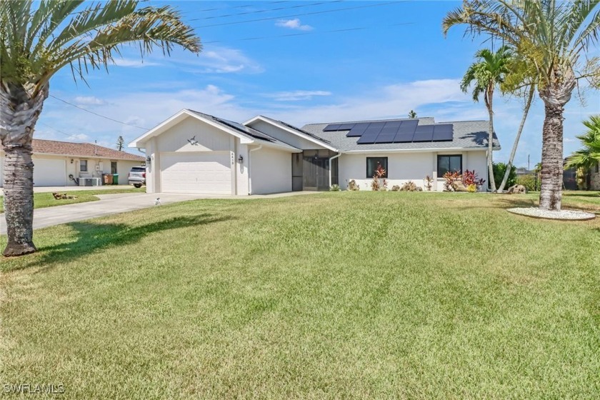 NEW ROOF! CITY WATER AND SEWER IN AND PAID! Feast your eyes on - Beach Home for sale in Cape Coral, Florida on Beachhouse.com