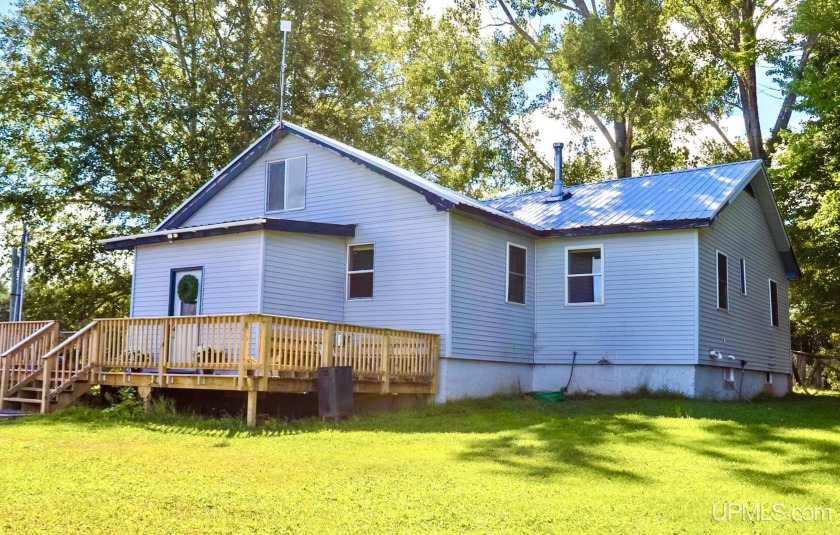 Country living just outside of Lake Linden! This four bedroom - Beach Home for sale in Lake Linden, Michigan on Beachhouse.com