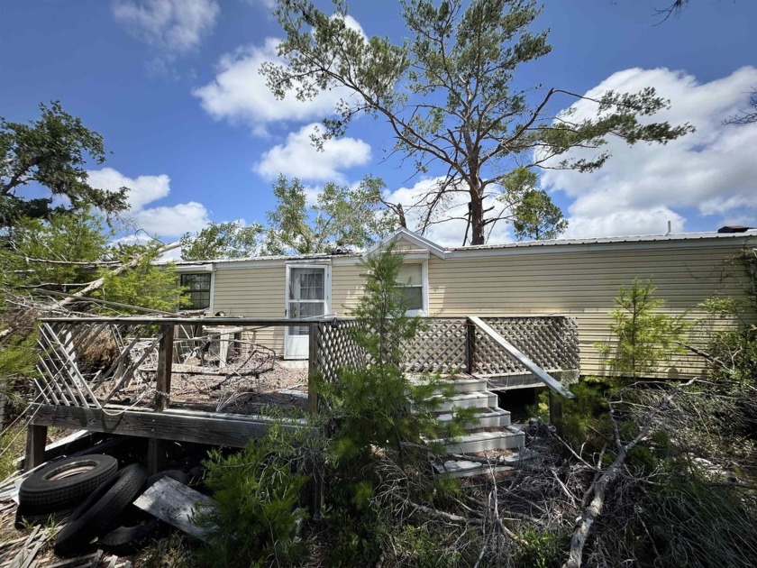 Located just minutes from Keaton Beach, this 1-acre fenced - Beach Home for sale in Keaton Beach, Florida on Beachhouse.com