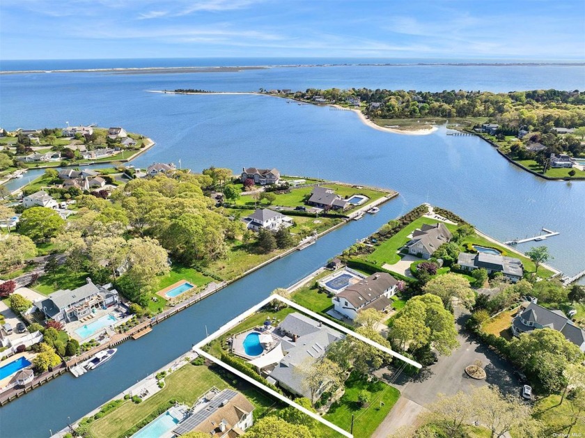 Located within the exclusive Old Harbor Colony Community in - Beach Home for sale in Hampton Bays, New York on Beachhouse.com