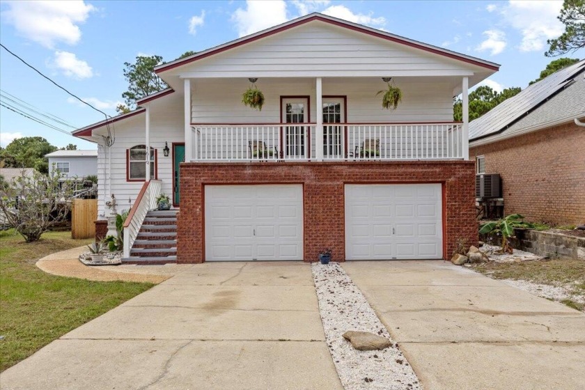 Experience refined waterfront living in Gulf Breeze. This custom - Beach Home for sale in Gulf Breeze, Florida on Beachhouse.com