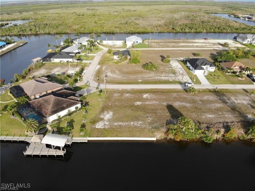 DIRECT, no bridges, gulf sailboat access lot with a seawall in - Beach Lot for sale in Cape Coral, Florida on Beachhouse.com