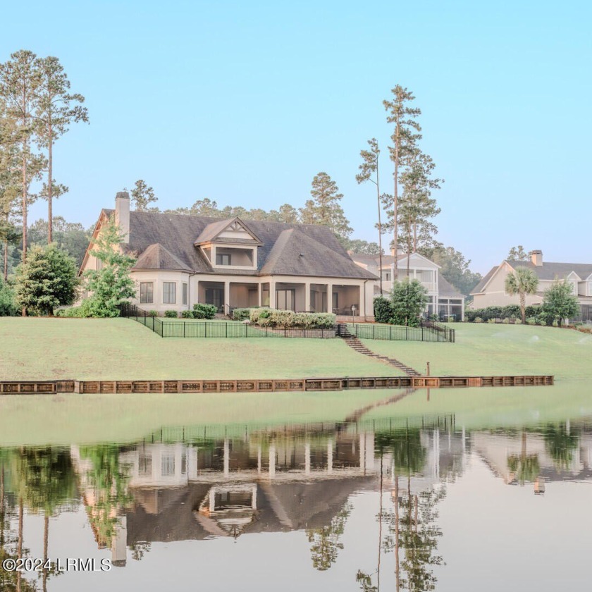 This Hampton Lake home offers unique 180 degree views of the - Beach Home for sale in Bluffton, South Carolina on Beachhouse.com