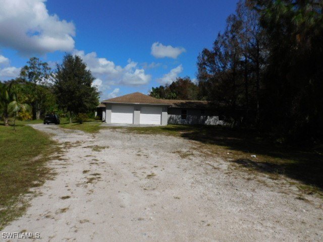 5 Acres of land to enjoy! This home features a creek that is - Beach Home for sale in Naples, Florida on Beachhouse.com