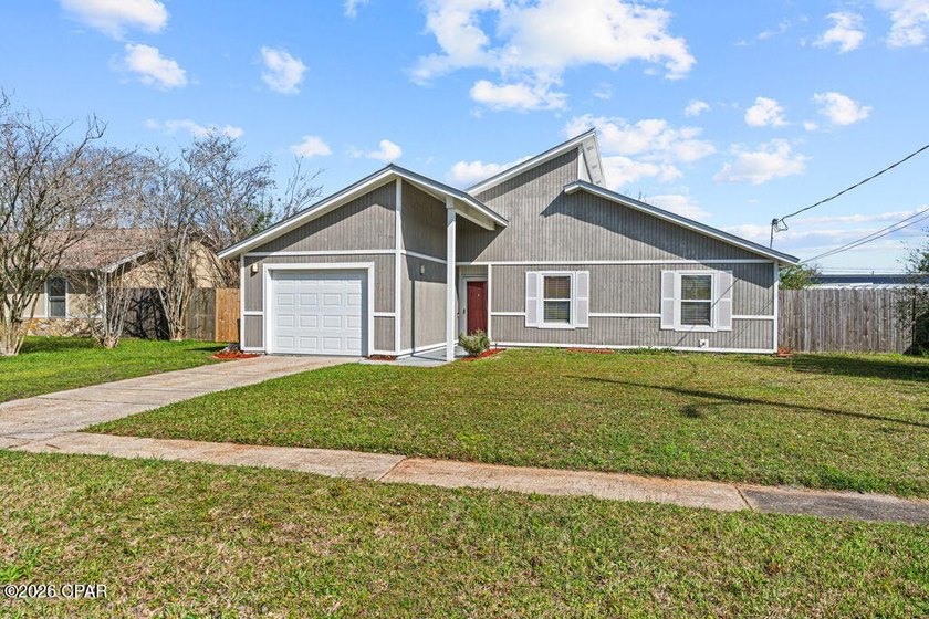 Welcome home to this charming 3 bedroom, 2 bath home offering 1 - Beach Home for sale in Lynn Haven, Florida on Beachhouse.com
