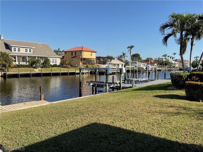 Deep water channel home in desireable Palm Acres. Damaged by - Beach Home for sale in Fort Myers, Florida on Beachhouse.com