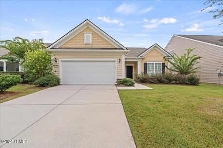 Nestled in the serene community of Sun City, this 3-bedroom, 2 - Beach Home for sale in Okatie, South Carolina on Beachhouse.com