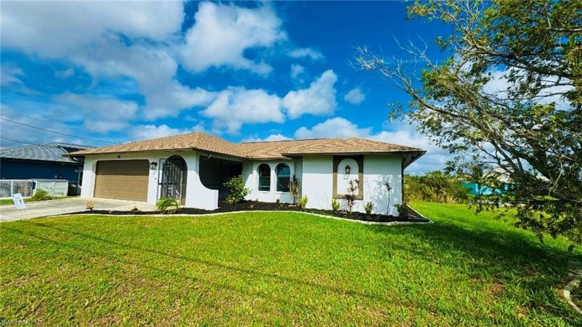 Welcome to 115 SE 6th St, Cape Coral, FL! This beautifully - Beach Home for sale in Cape Coral, Florida on Beachhouse.com