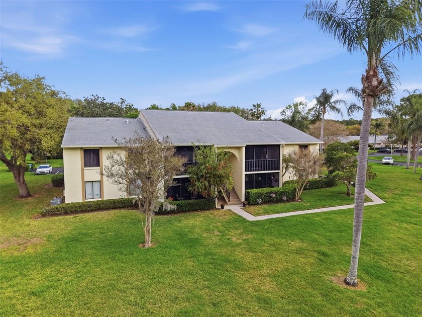 Discover the ease of Florida living in the desirable Deer Hollow - Beach Condo for sale in Tarpon Springs, Florida on Beachhouse.com