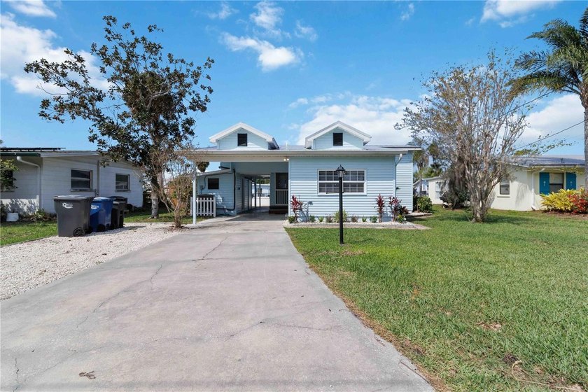 Welcome home to Manatee Avenue, where waterfront living meets - Beach Home for sale in Ellenton, Florida on Beachhouse.com