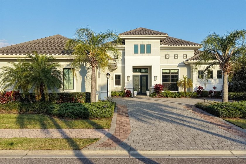 Welcome to 7473 Seacroft Cove, an elegant residence nestled - Beach Home for sale in Bradenton, Florida on Beachhouse.com