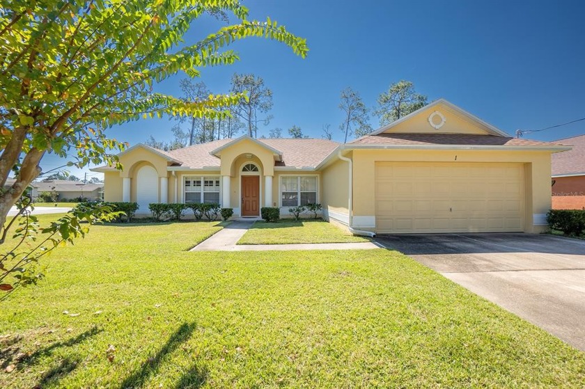 RECENTLY REDUCED! Don't miss out on this home! Located on a - Beach Home for sale in Palm Coast, Florida on Beachhouse.com