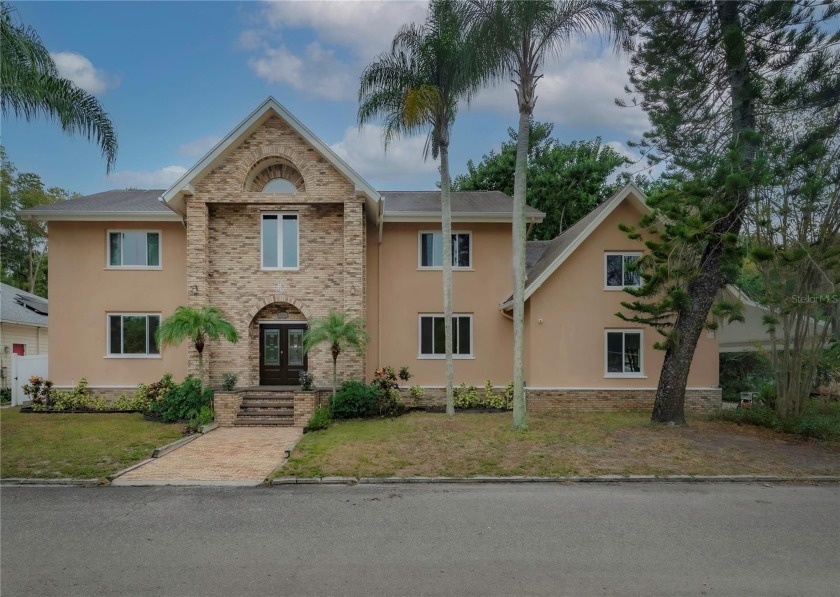 Welcome to paradise in Palm Harbor!  Enjoy this huge home with - Beach Home for sale in Palm Harbor, Florida on Beachhouse.com